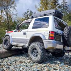 Cargo box from Packasport mounted on off-road vehicle roof